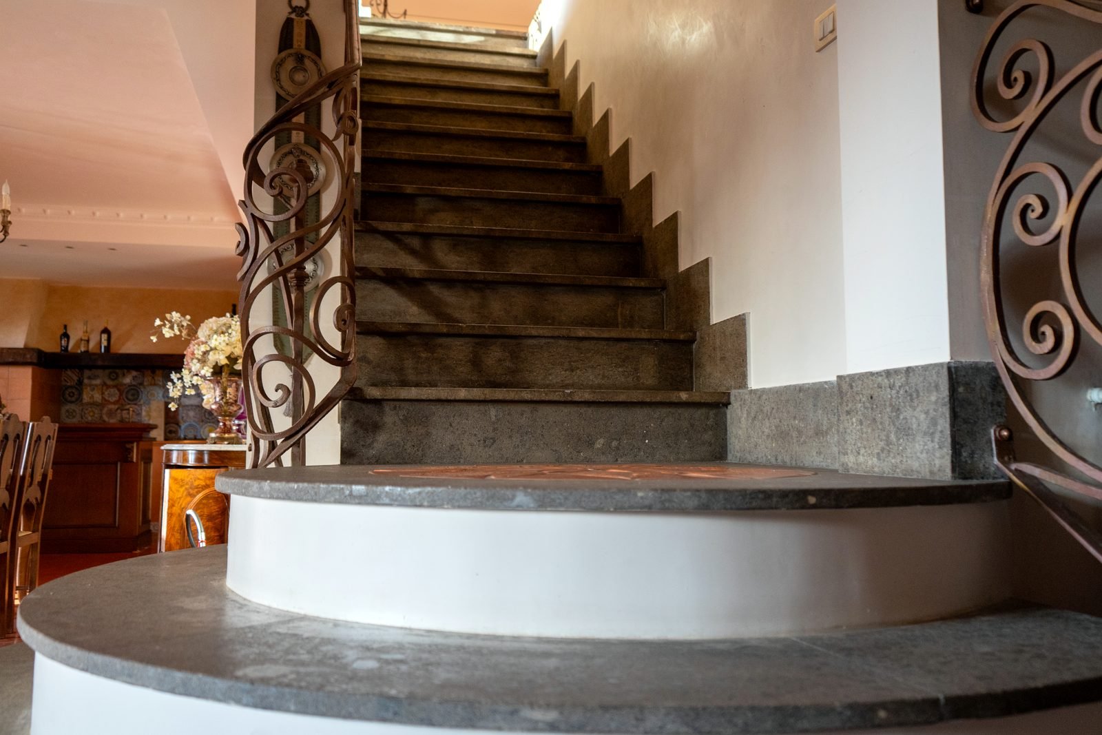 Stone staircase with wrought-iron balustrade